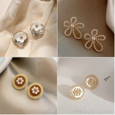 Fresh sweet flower earrings 2022 new pearl earrings S925 silver temperament retro ear decoration Yiwu jewelry